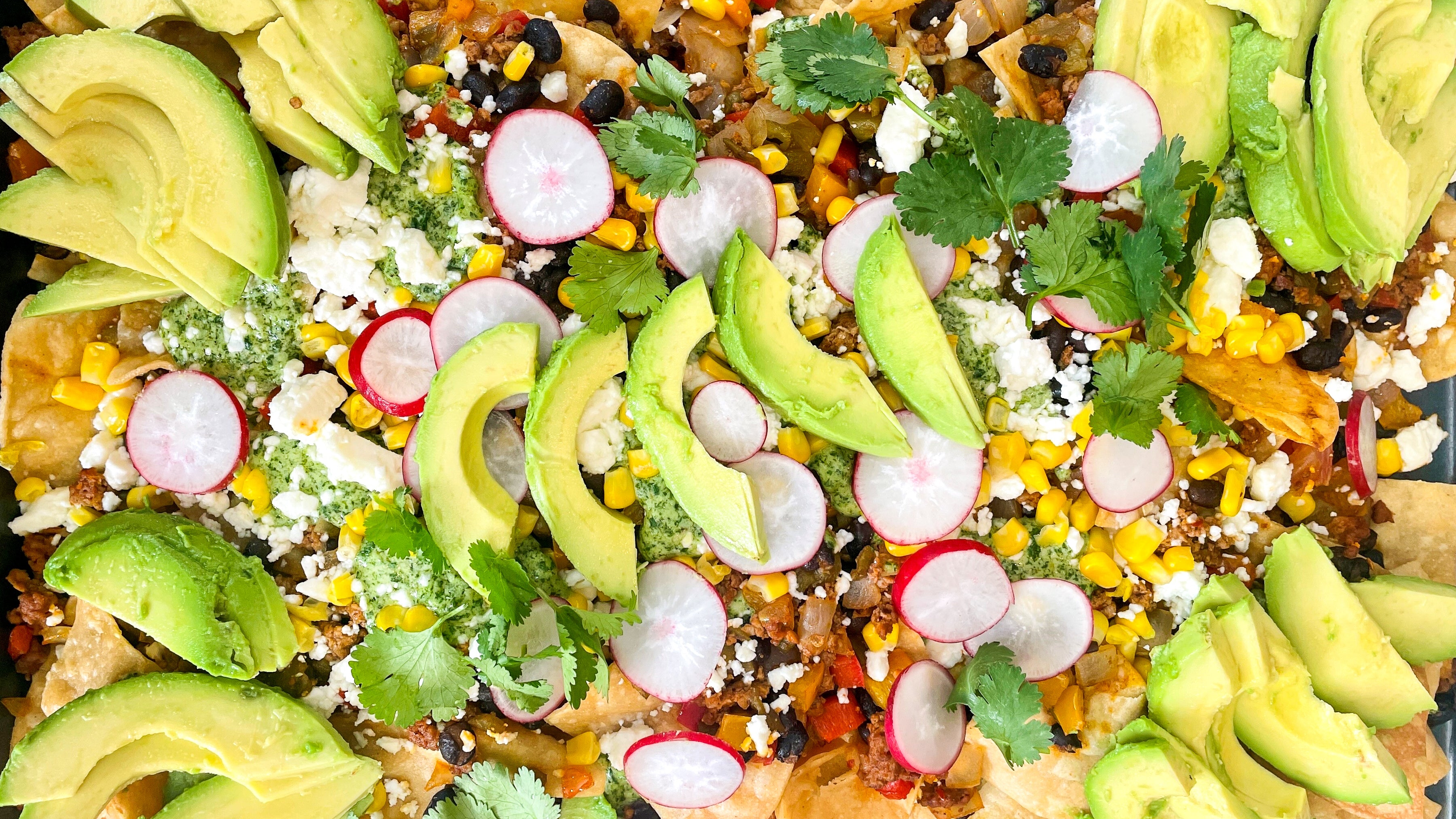 Sheet Pan Nachos with Green Chile Crema